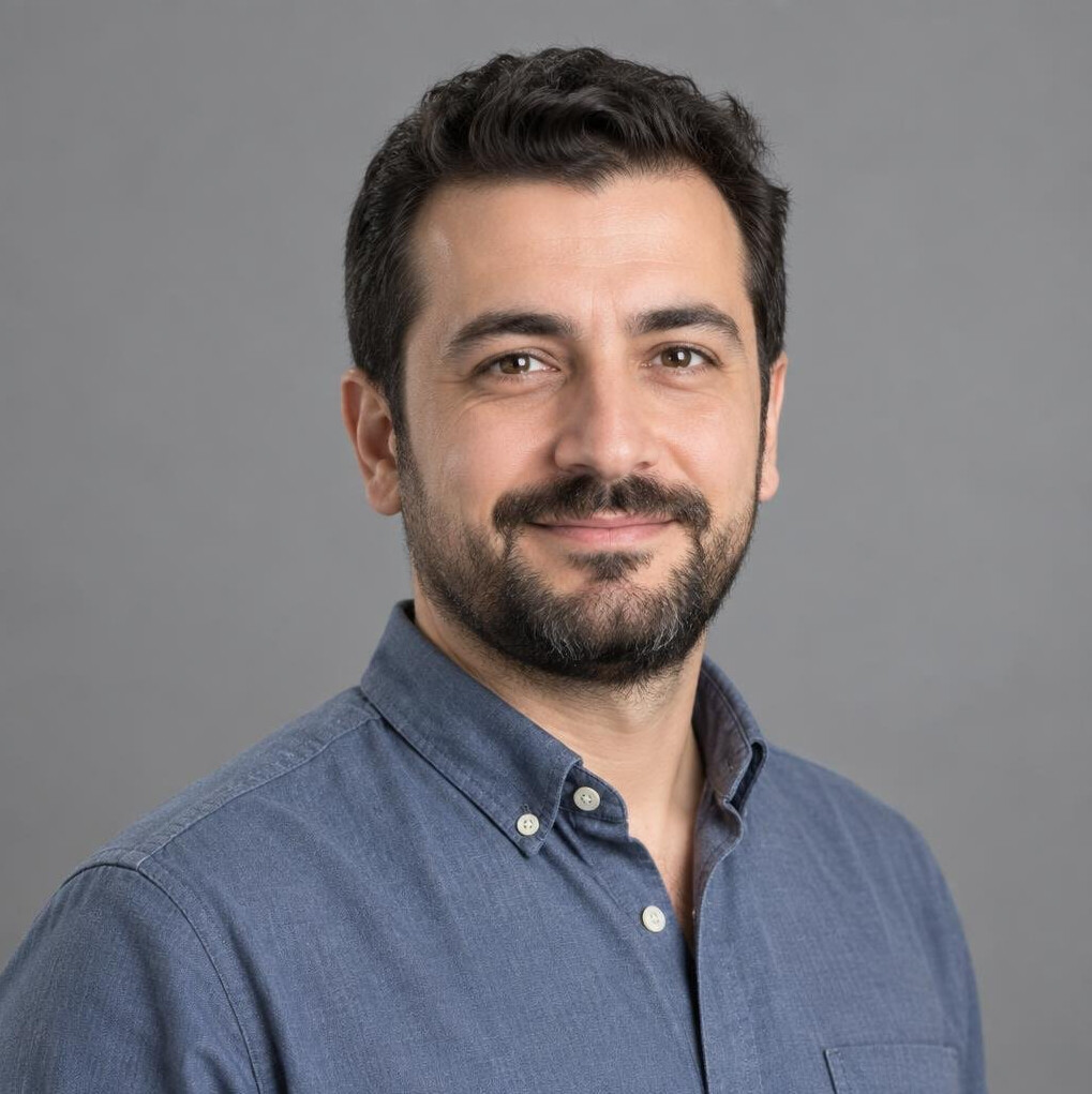 Turkish man technical director professional headshot