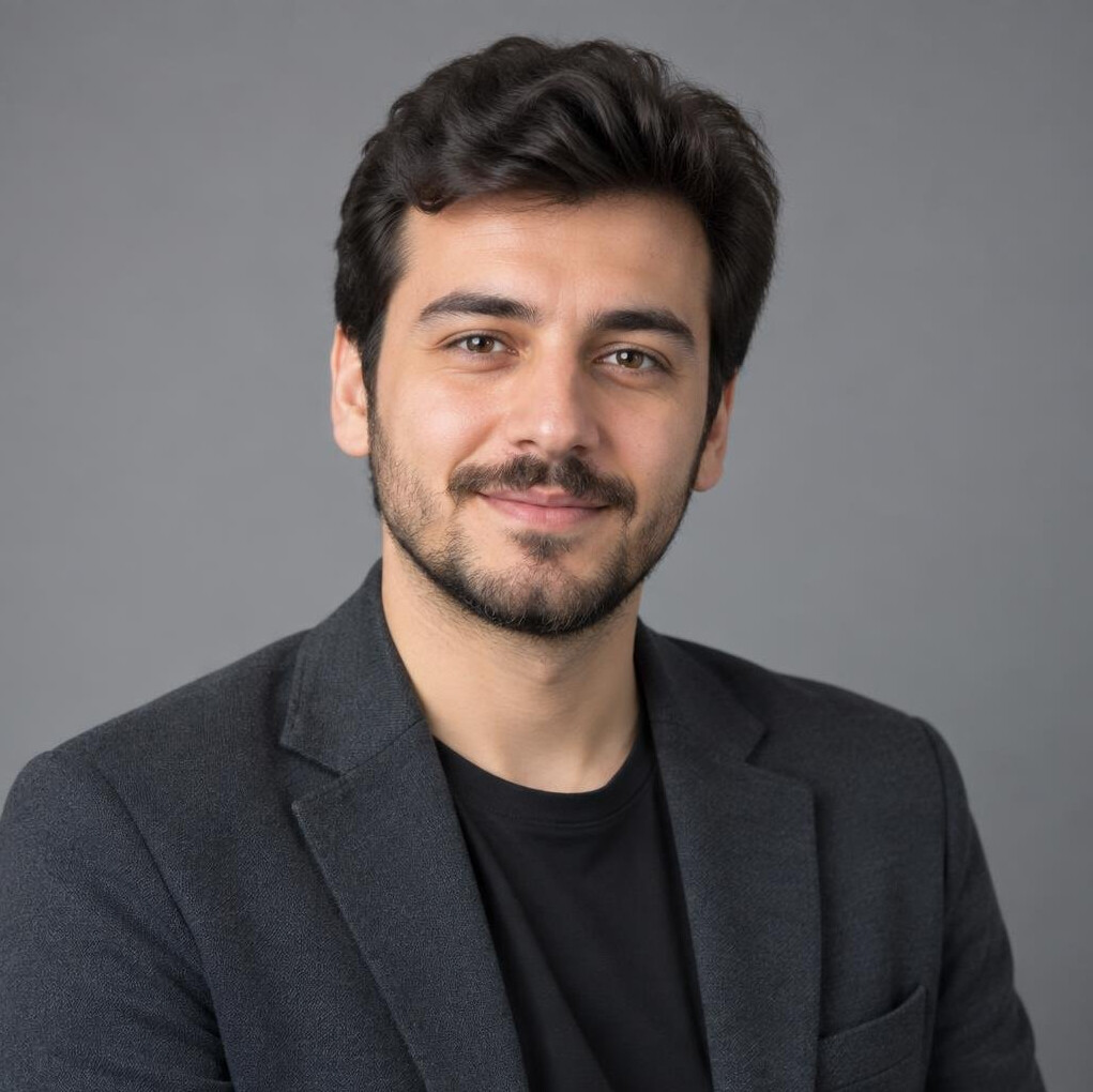 Turkish man content editor professional headshot
