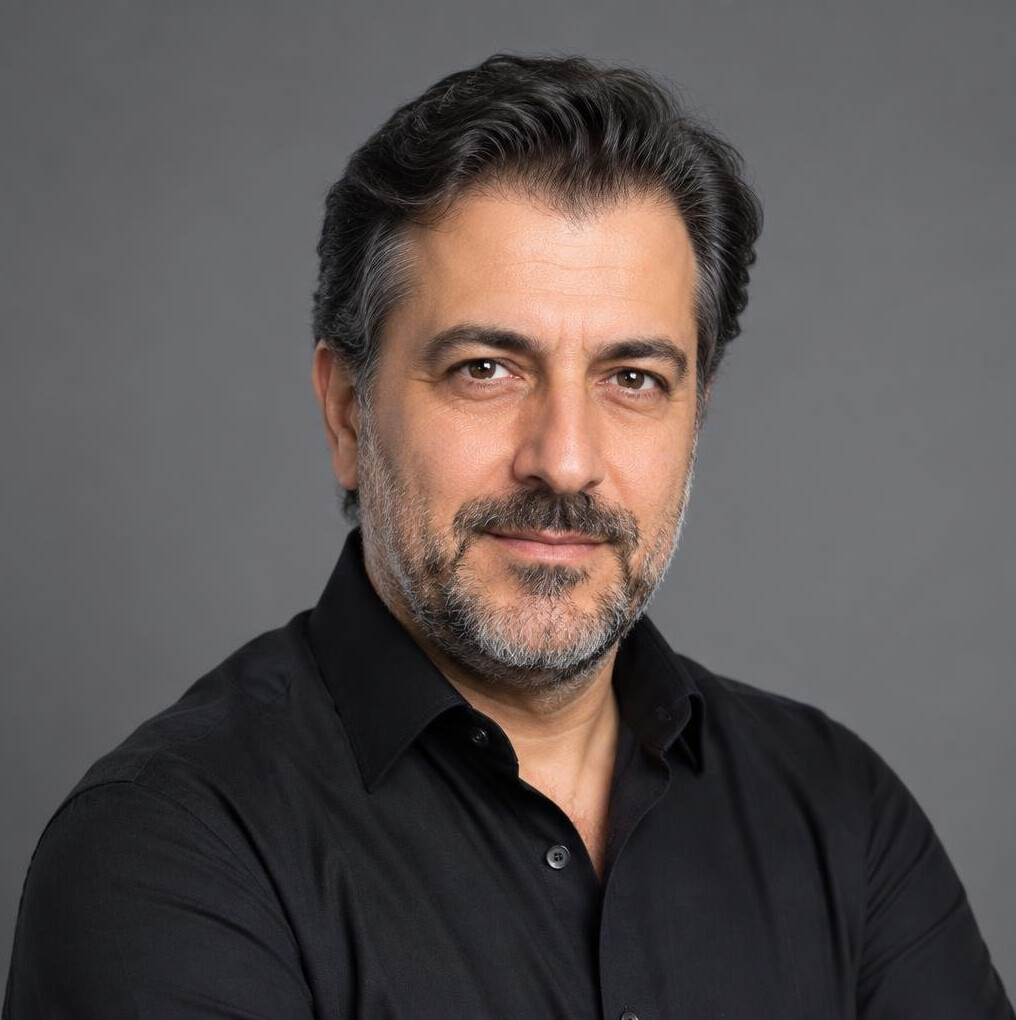 Turkish man broadcast director professional headshot